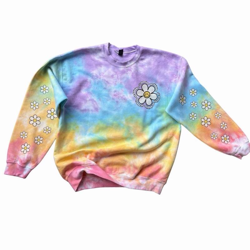 All oopsies no daisies. Whimsy, tiedye. Arm designs. Crewneck