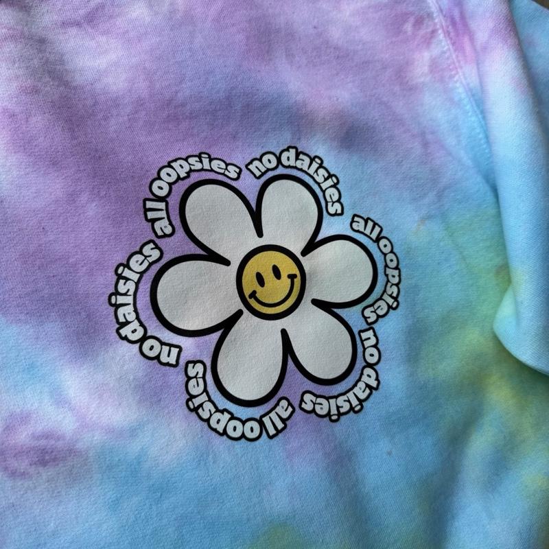 All oopsies no daisies. Whimsy, tiedye. Arm designs. Crewneck