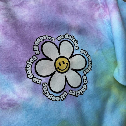 All oopsies no daisies. Whimsy, tiedye. Arm designs. Crewneck