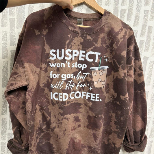Suspect won’t stop for gas but will stop for iced coffee crewneck. Suspect challenge crewneck